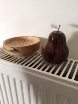 Wooden bowl and pear by Gordon Askew